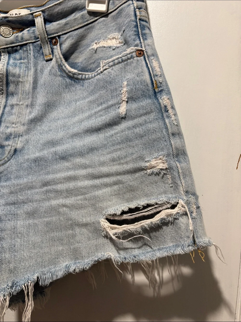 AGOLDE Parker distressed long denim shorts